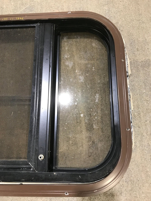 Used Black Radius Opening Window : 24 3/4" W x 15 3/4" H x 1 1/2" D - Young Farts RV Parts