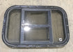 Used Black Radius Opening Window : 24 3/4" W x 15 3/4" H x 1 1/2" D - Young Farts RV Parts