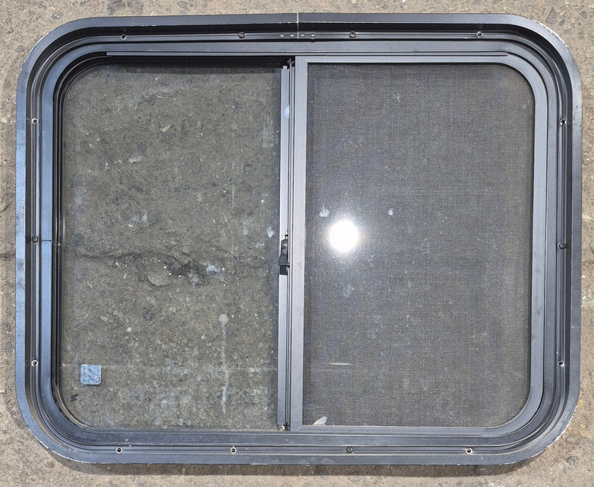 Used Black Radius Opening Window : 25 1/2" W x 20" H x 1 3/4" - Young Farts RV Parts