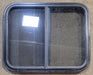 Used Black Radius Opening Window : 25 1/2" W x 20" H x 1 3/4" - Young Farts RV Parts