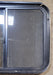 Used Black Radius Opening Window : 25 1/2" W x 20" H x 1 3/4" - Young Farts RV Parts