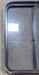 Used Black Radius Opening Window : 25 1/2" W x 28 1/2" H x 1 3/4" - Young Farts RV Parts