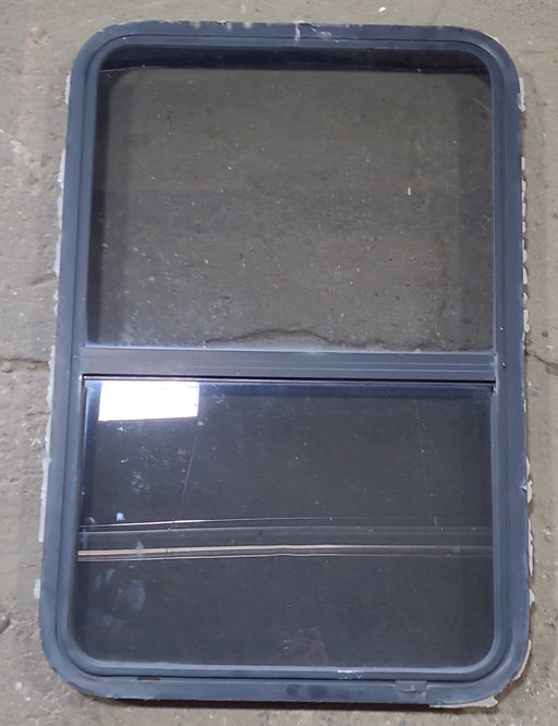 Used Black Radius Opening Window : 26 1/2" W x 39 3/4" H x 1 3/4" D - Young Farts RV Parts
