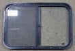 Used Black Radius Opening Window : 27 1/2" W x 18 5/8" H x 1" D - Young Farts RV Parts
