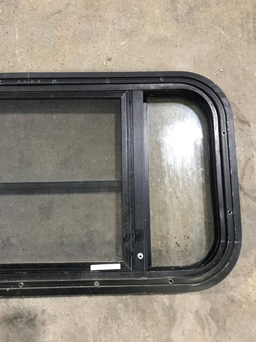 Used Black Radius Opening Window : 29 1/2" W x 14 1/2" H x 2" - Young Farts RV Parts