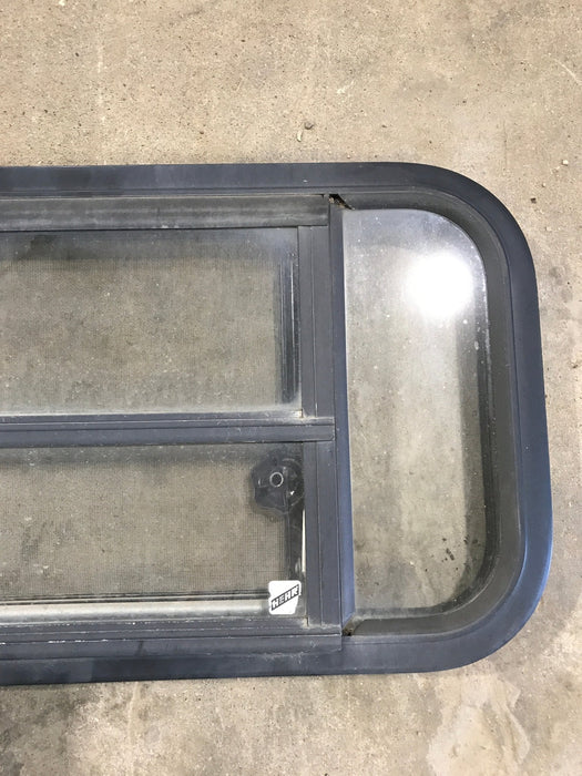 Used Black Radius Opening Window : 29 1/2" W x 14 1/2" H x 2" - Young Farts RV Parts