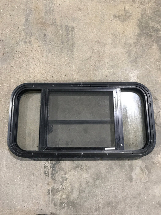 Used Black Radius Opening Window : 29 1/2" W x 14 1/2" H x 2" - Young Farts RV Parts