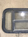 Used Black Radius Opening Window : 29 1/2" W x 14 1/2" H x 2" - Young Farts RV Parts