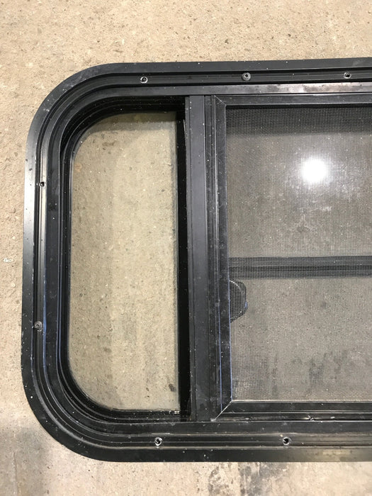Used Black Radius Opening Window : 29 1/2" W x 14 1/2" H x 2" - Young Farts RV Parts