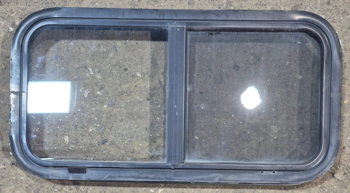 Used Black Radius Opening Window : 29 1/2" W x 14 3/4" H x 1 7/8" - Young Farts RV Parts