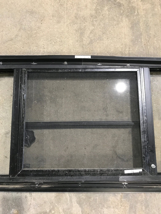 Used Black Radius Opening Window : 29 1/2" W x 14 3/4" H x 2" - Young Farts RV Parts