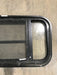 Used Black Radius Opening Window : 29 1/2" W x 14 3/4" H x 2" - Young Farts RV Parts