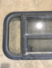 Used Black Radius Opening Window : 29 1/2" W x 14 3/4" H x 2" - Young Farts RV Parts