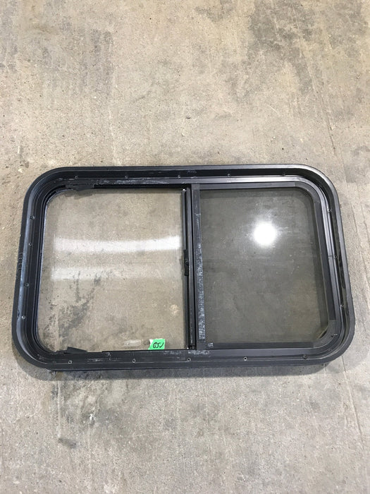 Used Black Radius Opening Window : 29 1/2" W x 17 1/2" H x 2" - Young Farts RV Parts