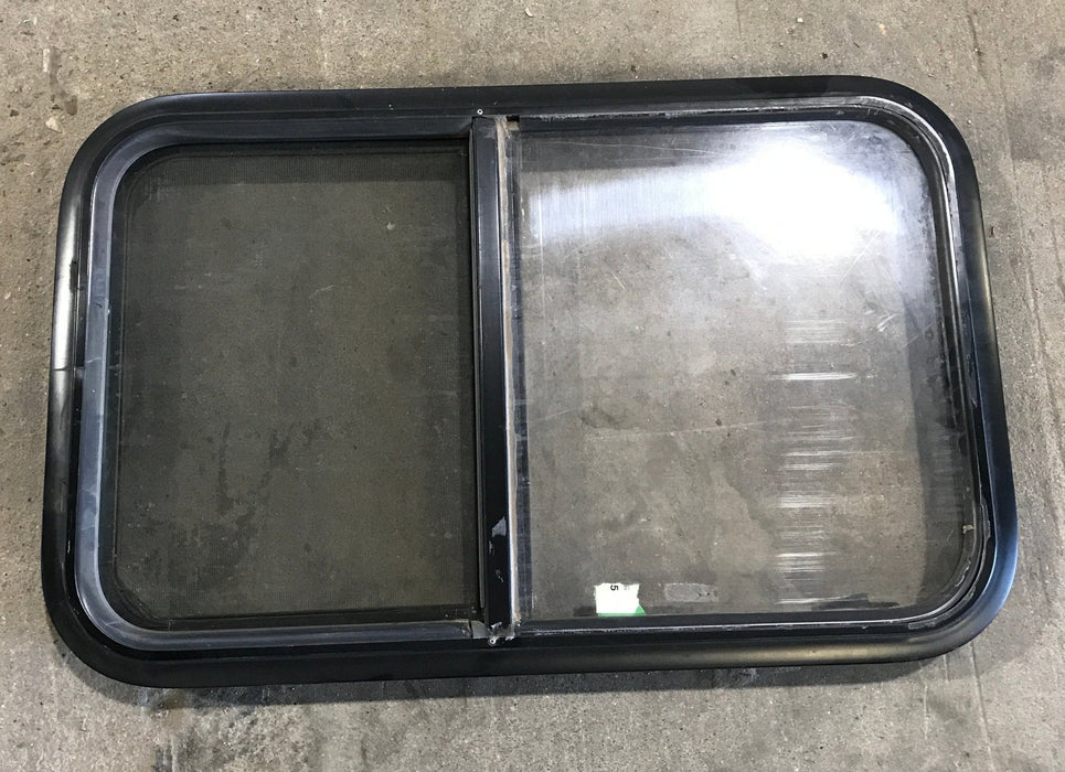 Used Black Radius Opening Window : 29 1/2" W x 17 1/2" H x 2" - Young Farts RV Parts