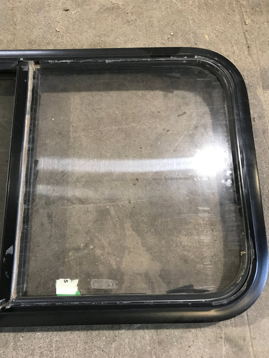 Used Black Radius Opening Window : 29 1/2" W x 17 1/2" H x 2" - Young Farts RV Parts