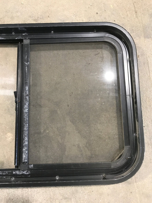 Used Black Radius Opening Window : 29 1/2" W x 17 1/2" H x 2" - Young Farts RV Parts