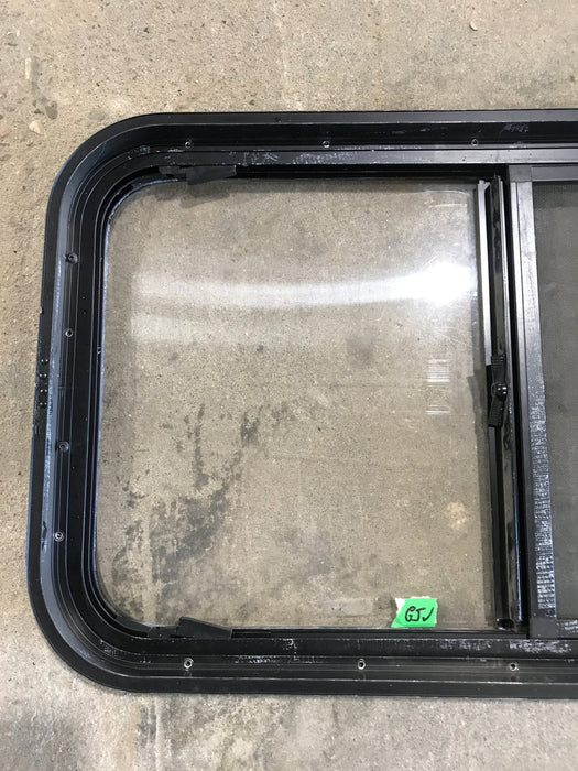 Used Black Radius Opening Window : 29 1/2" W x 17 1/2" H x 2" - Young Farts RV Parts