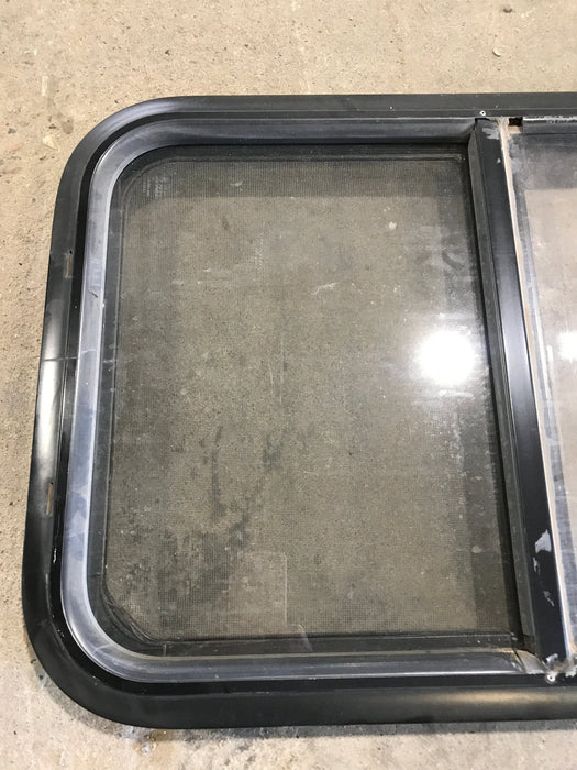 Used Black Radius Opening Window : 29 1/2" W x 17 1/2" H x 2" - Young Farts RV Parts