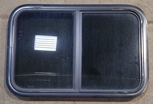 Used Black Radius Opening Window : 29 1/2" W x 19 1/2" H x 1 7/8" D - Young Farts RV Parts