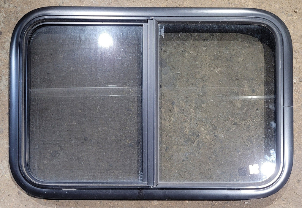 Used Black Radius Opening Window : 29 1/2" W x 19 1/4" H x 1 7/8" - Young Farts RV Parts