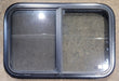 Used Black Radius Opening Window : 29 1/2" W x 19 1/4" H x 1 7/8" - Young Farts RV Parts