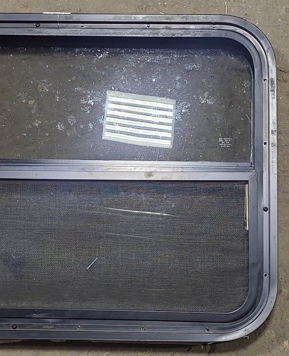 Used Black Radius Opening Window : 29 1/4" W x 21 1/2" H x 1 7/8" D - Young Farts RV Parts