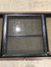 Used Black Radius Opening Window : 30 1/2" W x 18 3/4" H x 1 1/2" D - Young Farts RV Parts