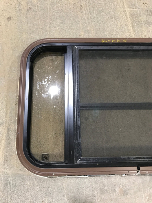 Used Black Radius Opening Window : 30 1/2" W x 18 3/4" H x 1 1/2" D - Young Farts RV Parts