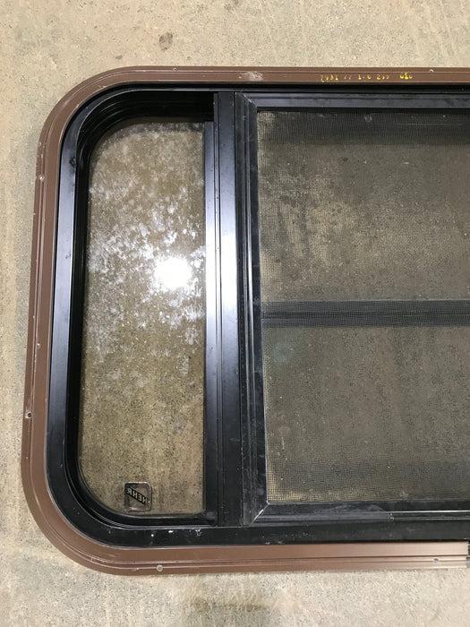 Used Black Radius Opening Window : 30 1/2" W x 18 3/4" H x 1 1/2" D - Young Farts RV Parts