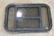 Used Black Radius Opening Window : 30 1/2" W x 18 3/4" H x 1 1/2" D - Young Farts RV Parts
