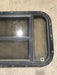 Used Black Radius Opening Window : 30 1/2" W x 18 3/4" H x 1 1/2" D - Young Farts RV Parts