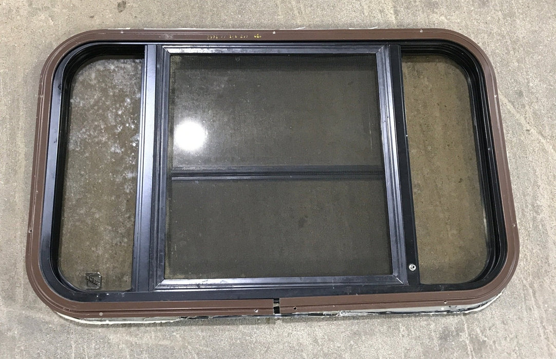 Used Black Radius Opening Window : 30 1/2" W x 18 3/4" H x 1 1/2" D - Young Farts RV Parts