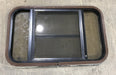 Used Black Radius Opening Window : 30 1/2" W x 18 3/4" H x 1 1/2" D - Young Farts RV Parts