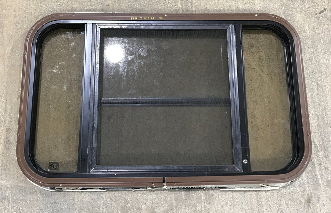 Used Black Radius Opening Window : 30 1/2" W x 18 3/4" H x 1 1/2" D - Young Farts RV Parts