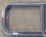 Used Black Radius Opening Window : 30 1/4" W x 11 3/4" H x 1 3/4" D - Young Farts RV Parts