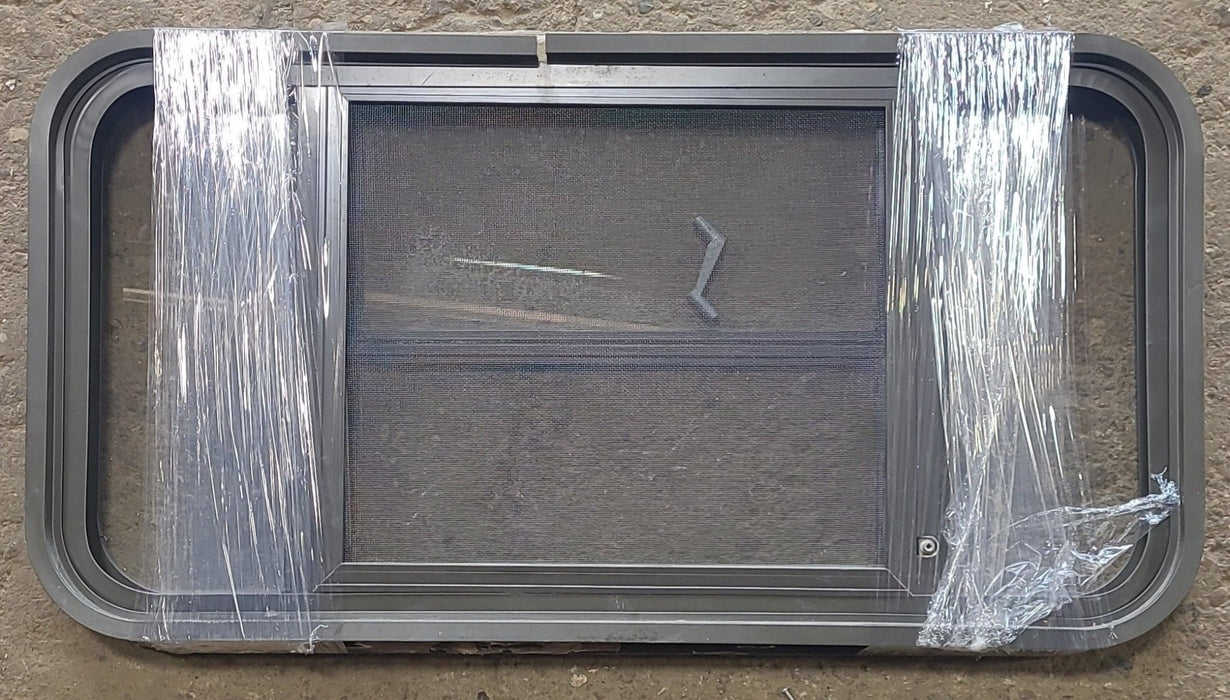 Used Black Radius Opening Window : 31 3/4" W x 16 1/2" H x 1 7/8" D - Young Farts RV Parts