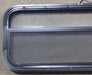 Used Black Radius Opening Window : 35 1/2" W x 14 1/4" H x 2" D - Young Farts RV Parts