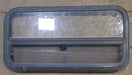 Used Black Radius Opening Window : 35 1/2" W x 17 1/4" H x 1 7/8" D - Young Farts RV Parts