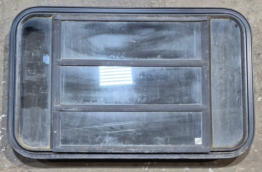 Used Black Radius Opening Window : 35 1/4" W x 21 1/2" H x 1 7/8" - Young Farts RV Parts