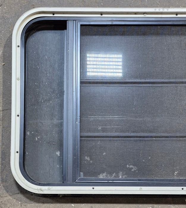 Used Black Radius Opening Window : 35 1/4" W x 21 1/2" H x 1 7/8" - Young Farts RV Parts