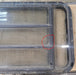 Used Black Radius Opening Window : 35 3/4" W x 22 5/8" H x 1 1/4" D - Young Farts RV Parts