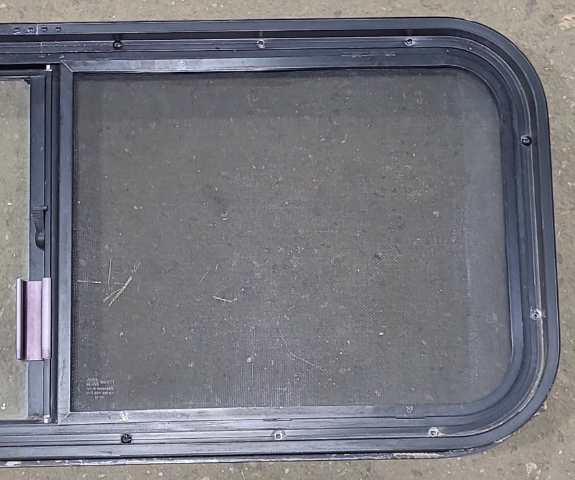 Used Black Radius Opening Window : 36 1/2" W x 14 3/4" H x 1 3/4" D - Young Farts RV Parts