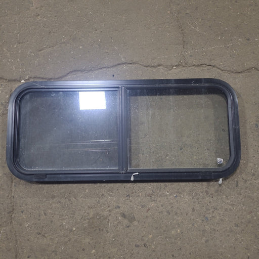 Used Black Radius Opening Window : 36 1/4" W x 14 3/4" H x 1 3/4" D - Young Farts RV Parts