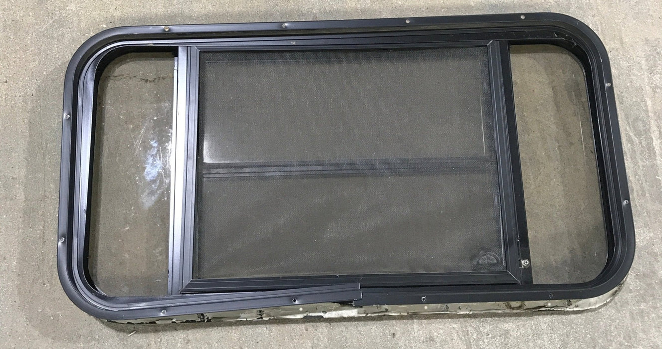 Used Black Radius Opening Window : 37" W x 19 1/4" H x 1 1/4" - Young Farts RV Parts