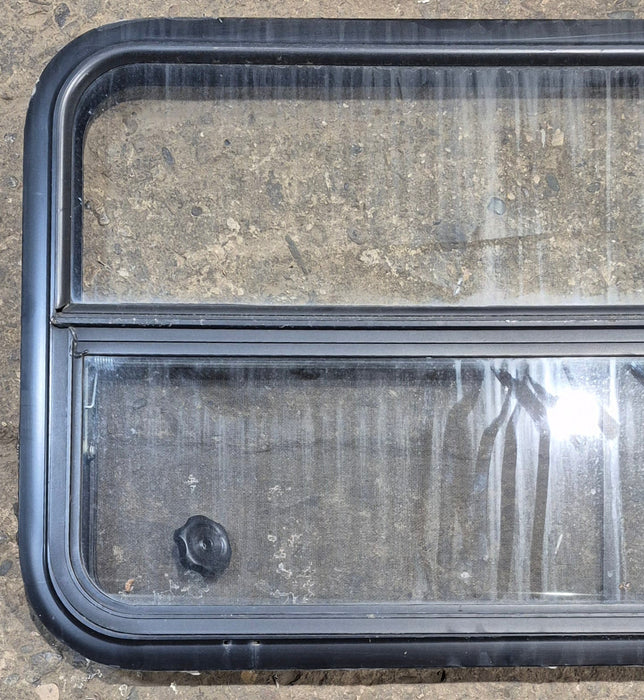 Used Black Radius Opening Window : 41 1/2" W x 21 1/2" H x 1 1/2" - Young Farts RV Parts
