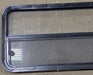 Used Black Radius Opening Window : 41 1/2" W x 21 1/4" H x 1 3/4" D - Young Farts RV Parts