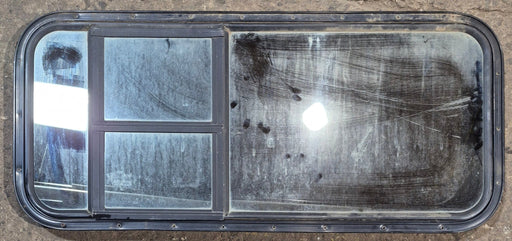 Used Black Radius Opening Window : 41 5/8" W x 17 7/8" H x 1 1/2" D - Young Farts RV Parts