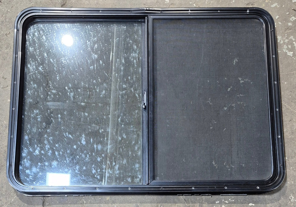 Used Black Radius Opening Window : 42 1/2" W x 34" H x 1 3/4" D - Young Farts RV Parts