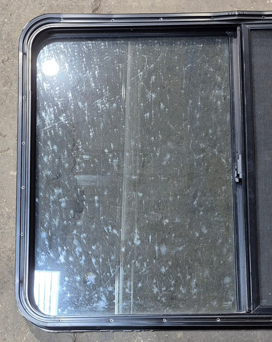 Used Black Radius Opening Window : 42 1/2" W x 34" H x 1 3/4" D - Young Farts RV Parts